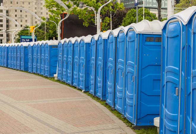 a row of portable restrooms at a fairground, offering visitors a clean and hassle-free experience in East Palo Alto